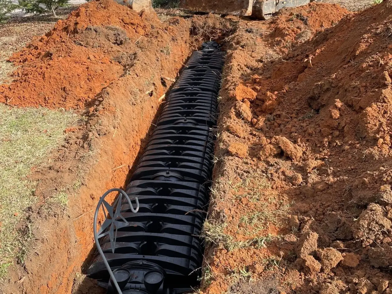 New chamber field lines laid in a trench by our excavator in Brookwood, AL
